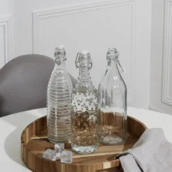 BOUTEILLE EN VERRE A CLAPET EMBOSSE 1L