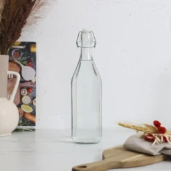 BOUTEILLE EN VERRE A CLAPET EMBOSSE 1L