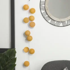 GUIRLANDE LED SECTEUR 20 BOULES OCRE D.6CM
