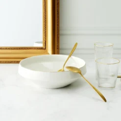 SALADIER EN PORCELAINE LISERE DORE D25CM